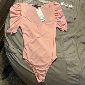 pink body suit